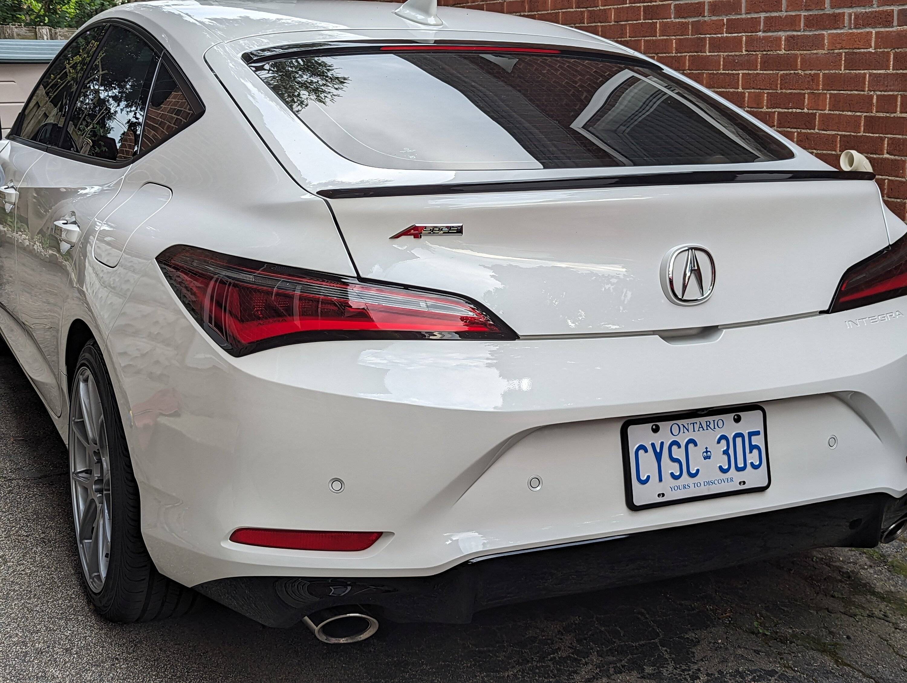 Acura Integra Type S w/ black emblems on red vinyl. Don't really like. Thoughts? PXL_20230814_230933415